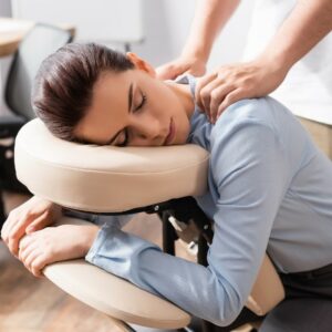 woman receiving chair massage