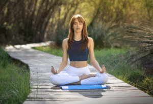 woman meditating outdoors