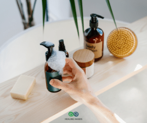 facial products and soap on a bathroom shelf