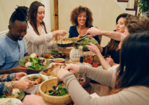 A group of friends enjoying a Thanksgiving meal