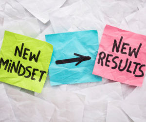 post-its with "new mindset, new results" written